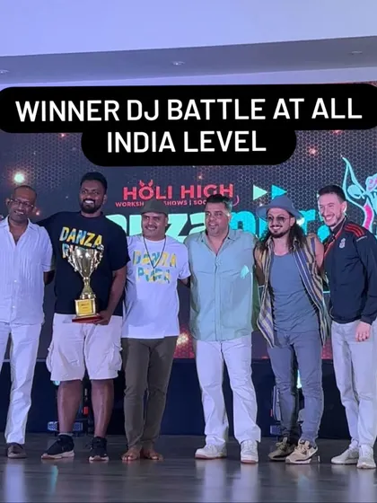 On stage with the judges and organizers after winning the All India Level DJ Battle. A moment of celebration and recognition.