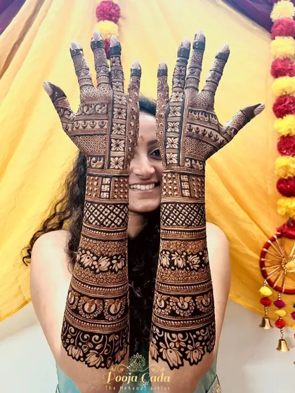 A beautiful non-figurative design for an NRI bride from the US, showcasing her love for peacocks and intricate patterns.