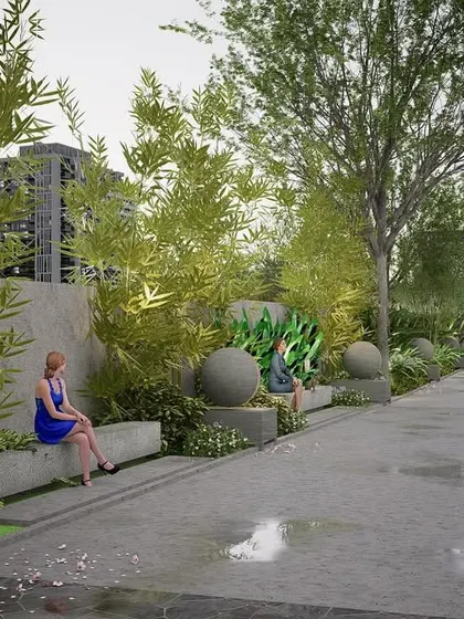 This linear park in a Bengaluru apartment complex uses spherical sculptures and lighting elements to contrast with the site's linear form. The design includes integrated concrete benches and bamboo plantings to create a series of relaxing pause points.
