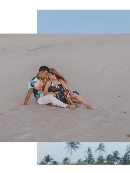 A relaxed moment on the sand. This photo captures the feeling of just sitting together, enjoying the beach and each other's company.