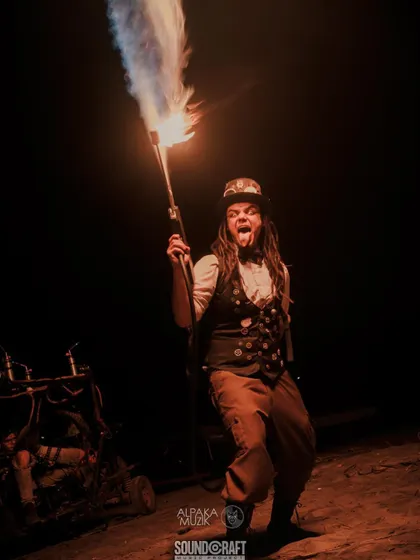 Our male Steampunk artist wields a fire gun, adding a dangerous and exciting element to the performance. This prop is always a crowd favorite.