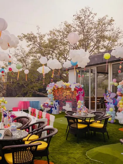 A beautiful My Little Pony theme party on our rooftop terrace. The paper lanterns shaped like clouds and pastel balloon arches create a magical sky-scape.