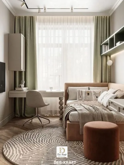 This compact bedroom is designed for maximum functionality, with a cozy bed, a dedicated study area, and ample storage, all in a soothing, earthy color palette.