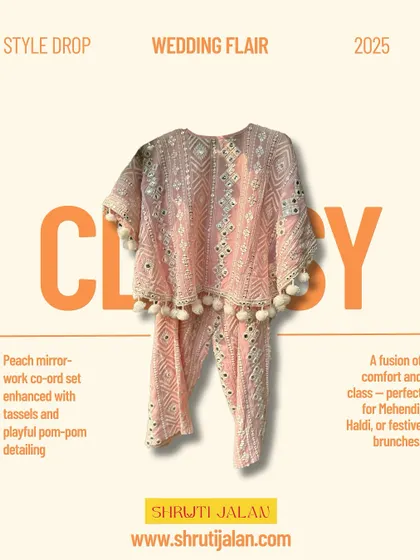 This classy peach mirror-work co-ord set is enhanced with tassels and playful pom-pom detailing. It’s a perfect fusion of comfort and class for Mehendi, Haldi, or festive brunches.
