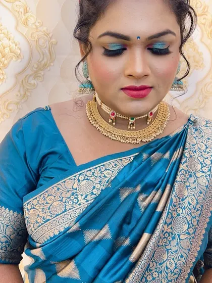 A close-up of the blue-themed festive look, showing the blend of eyeshadow colours.
