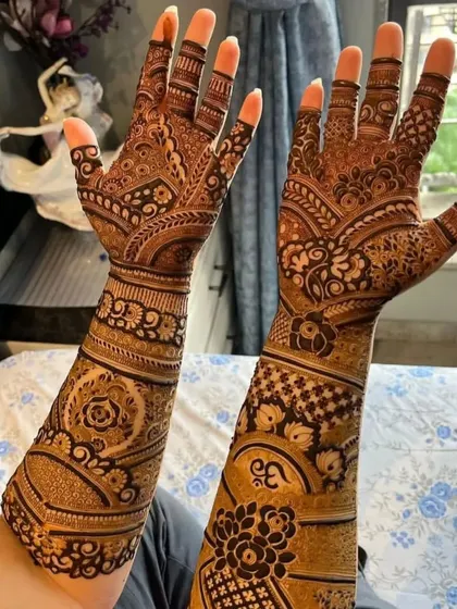 A full-arm design with a mix of many different traditional patterns, showing the richness and variety I can bring to your bridal mehndi.