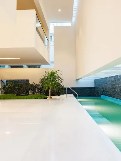 swimming pool at guest level… the water body is integrated into the ground floor living area.