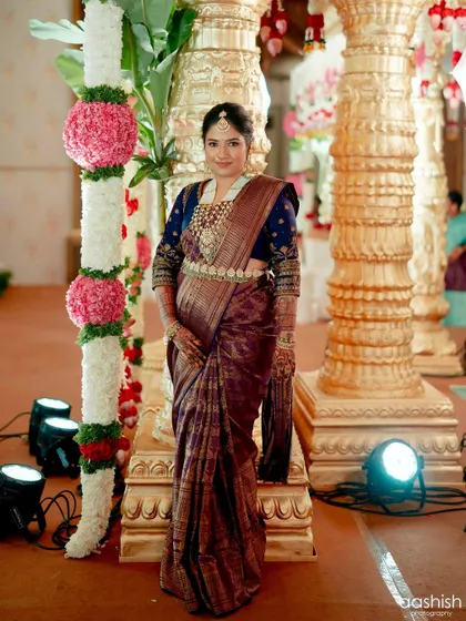 Draped in heritage, adorned with grace. This bride carries an exquisite antique vintage weave saree, and her makeup is designed to match its timeless charm with a focus on elegant, classic features.