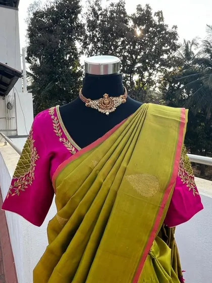 A close-up of the embroidered blouse.