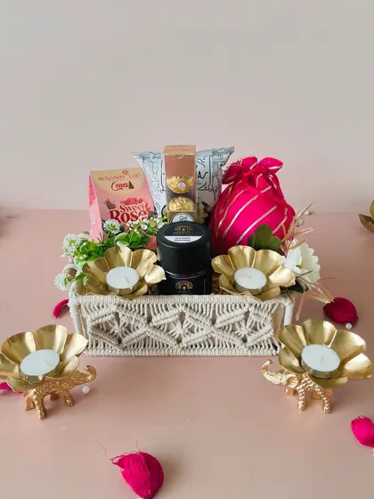 This setup shows how our macrame tray hampers can be the centerpiece of a beautiful Diwali gift arrangement.