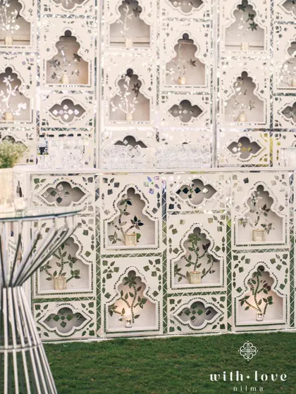 A close-up of the Thikri-paneled bar, showcasing the intricate patterns and reflective beauty. It’s a perfect example of how we blend art with function.