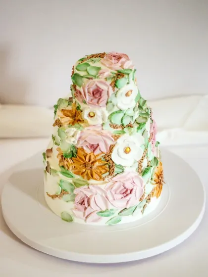 For those extra special celebrations, I love creating tiered masterpieces like this. This three-tier cake is fully covered in hand-painted florals, making it a true showstopper for a milestone birthday or an intimate wedding.