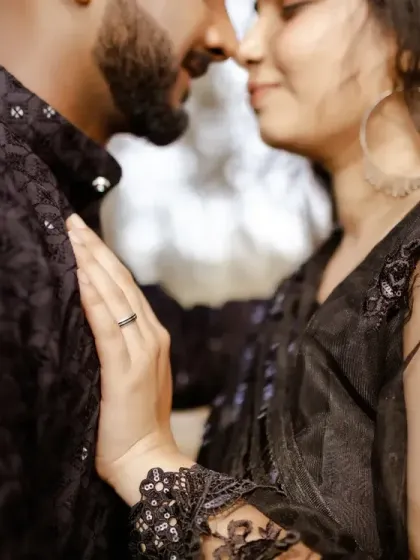 A close-up shot focusing on the gentle touch and the unspoken connection. Sometimes the most powerful photos are in the smallest details.