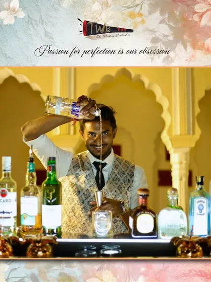 Our bartender showcasing his flair against the beautiful architectural backdrop of the Ranthambore venue.