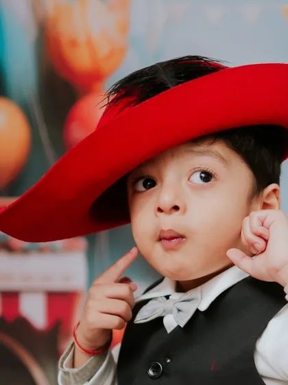 A close-up of our little carnival star. His expressive face and dapper outfit made this second birthday shoot so much fun.