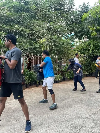 Starting the day strong with our morning outdoor batch. We take the training outside to work on kickboxing drills with pads and shields in the fresh air.