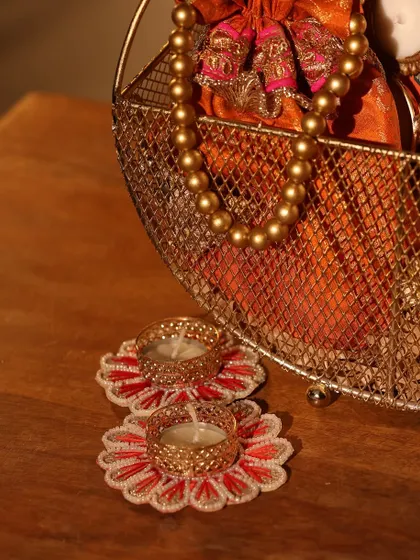 These embroidered flower T-light holders add a delicate and traditional touch to my Diwali gift sets.