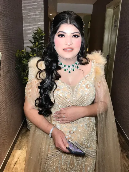 A happy and confident engagement stunner, ready for her party.