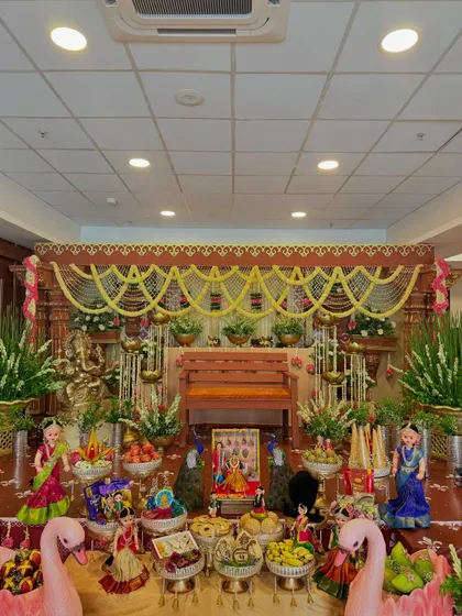 Another angle of the elaborate traditional setup, showing the scale and richness of the decorations.