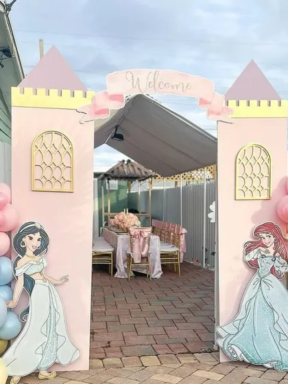 A princess castle entrance for a backyard party. We can turn any space into a fairytale kingdom for your child's special day.