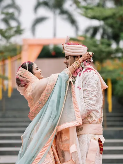 A beautiful, romantic moment from Disha and Prateek's varmala. The way she looks at him as she places the garland is just perfect.