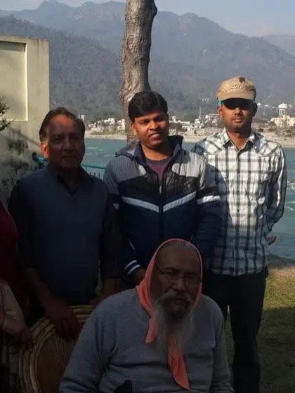 With my Guruji in the Himalayas. His advice that real "seva" (service) is bigger than "paisa" (money) is the foundation of my medical practice and my life.