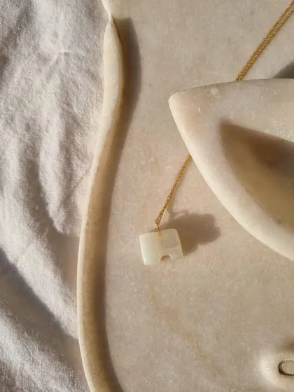 The White Moonstone 'haati' pendant, a symbol of luck and abundance.