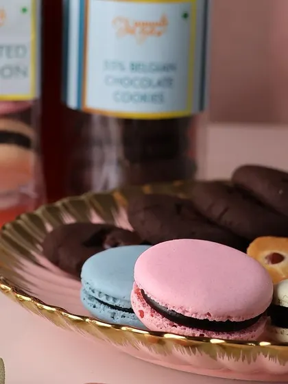 A premium Rakhi hamper selection featuring our assorted macarons and Belgian chocolate cookies. These treats are perfect for expressing your love and affection during Raksha Bandhan.