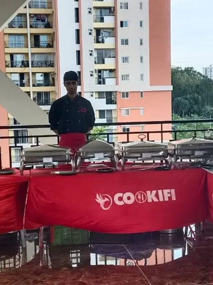 Our buffet station set up on a high-rise balcony, offering great food with a view for a memorable birthday celebration.