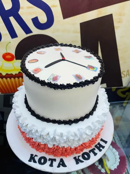 A 3kg "foodie clock" cake, with different food items marking the hours.