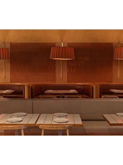 To create a sense of intimacy within the large Biergarten brewery, we designed these cozy seating booths. The warm, earthy palette of terracotta, wood, and ochre lime plaster provides a comfortable and elevated setting for guests to connect.