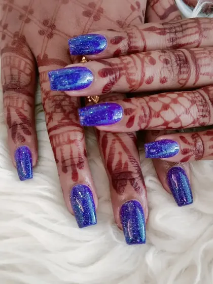 Another view of the sparkling blue glitter extensions.