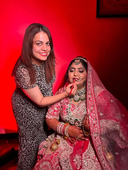A final portrait of me and the bride. It's always a pleasure to see the final look come together so beautifully.