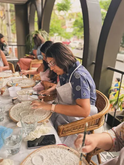 A group of artists hard at work on their moon lamps. The workshop is a great way to spend an afternoon, learning a new skill and meeting new people.