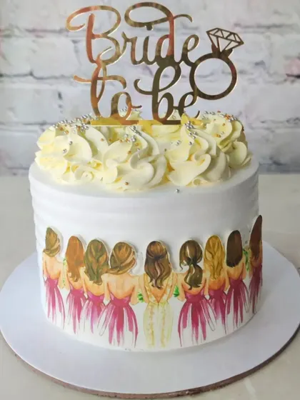 A closer look at our "Bride Tribe" cake. It's a wonderful way to honor the friendships that are such an important part of the wedding journey.