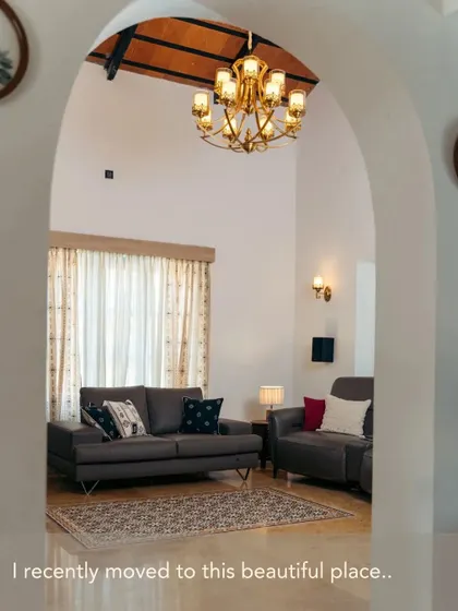 A beautiful archway frames the view into this living space, where our curtains serve as a soft, elegant backdrop. This is the first impression of a home styled with care and personality.