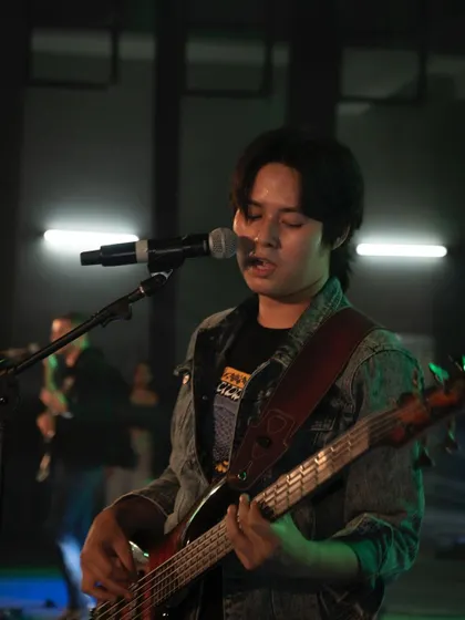 A shot of our talented bassist, who brings both melody and groove to our rhythm section.