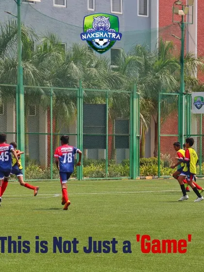 This is not just a game, it's an emotion. A wide shot of a competitive match in progress at our academy.