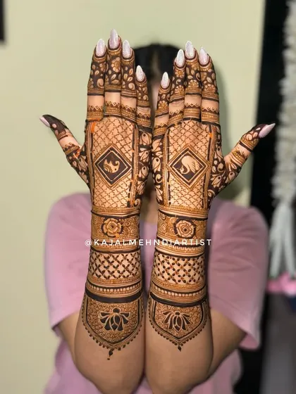 Henna for the groom's sister! This design features bold geometric patterns with a central elephant motif, a symbol of good luck and prosperity for the new couple.