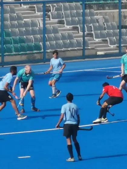 Players from both teams competing for the ball. These matches are played at a high tempo, testing the fitness and skill of my athletes.