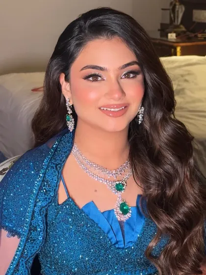 Another angle of this princess-like Sangeet look, highlighting the flawless complexion and the soft smile that shows her confidence and happiness.