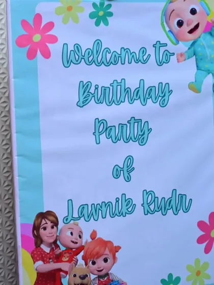 A custom welcome board for Lavnik Rudr's Cocomelon-themed first birthday party, featuring the beloved characters from the show.