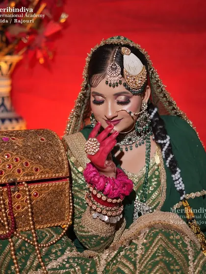 The bride interacting with a prop, giving a clear view of her side-parted hair and the placement of the 'passa'.