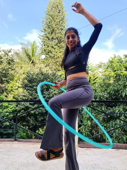 Another shot from my rooftop, just enjoying the movement. The flare pants and crop top combo is one of my favorites for a comfortable flow.