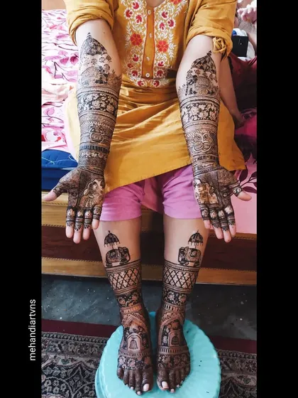A complete bridal mehandi set, covering both hands and feet with incredible detail. Our advanced course covers these extensive designs, including traditional doli and architectural motifs, preparing you for high value bridal projects.