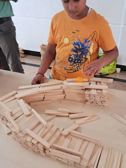 The focus in the room is always so real and inspiring. Each child gets their own set of planks and a space to bring their ideas to life, learning about balance and dedication through hands-on building.