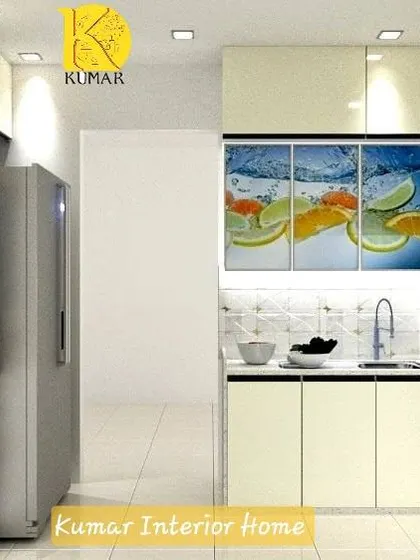 A partial view of the citrus-themed kitchen, showing the seamless integration of the sink and countertop area.