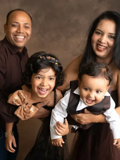 A family portrait bursting with joy and energy. I love capturing the playful, candid moments that show a family's true personality.