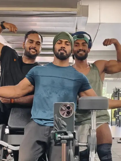 Another shot with the crew, flexing after a tough session. Having a solid group of gym bros keeps you accountable and makes the entire process more enjoyable.
