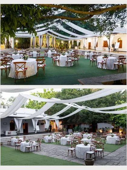An elegant outdoor seating arrangement featuring classic cross-back chairs and round tables with white linens. This timeless combination is perfect for creating an intimate and sophisticated dining experience.